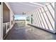 Outdoor kitchen space with stainless steel appliances and skyline view at 443 Plateau Nw Pl, Atlanta, GA 30309
