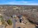 Scenic aerial view of luxury homes with golf course and mountains in the background at 602 Davenport Pl, Canton, GA 30115