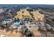 Community aerial view of the golf course, pool, tennis courts, and clubhouse at 602 Davenport Pl, Canton, GA 30115
