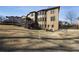Large backyard with a spacious lawn and multi-story home at 602 Davenport Pl, Canton, GA 30115