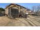 Expansive backyard featuring a screened porch and deck, ideal for outdoor entertaining and relaxation at 602 Davenport Pl, Canton, GA 30115