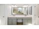 Bathroom with a double vanity and large mirror offers a clean, functional space at 602 Davenport Pl, Canton, GA 30115