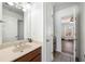 Bathroom featuring a vanity sink and an open doorway leading to another room at 602 Davenport Pl, Canton, GA 30115