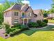 Stunning brick home with manicured landscaping and a welcoming entrance at 602 Davenport Pl, Canton, GA 30115