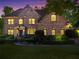 Charming two-story brick home with manicured lawn and landscaping, showcasing classic architectural details and curb appeal at 602 Davenport Pl, Canton, GA 30115