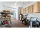 Well-organized garage with workbench, wooden cabinets, storage, and a sink at 602 Davenport Pl, Canton, GA 30115