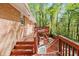 Multi-level decks offering ample outdoor living space and a view of the wooded backyard at 1618 Cooper Lake Se Rd, Smyrna, GA 30082