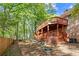 Enjoy outdoor living on the multi-tiered deck overlooking the private backyard at 1618 Cooper Lake Se Rd, Smyrna, GA 30082