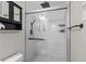 Newly renovated bathroom with a glass door shower and modern black fixtures at 1618 Cooper Lake Se Rd, Smyrna, GA 30082