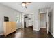 A bedroom with hardwood floors, a large window, and walk in closet at 1618 Cooper Lake Se Rd, Smyrna, GA 30082
