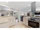 This kitchen offers tile flooring and a stainless steel oven at 1618 Cooper Lake Se Rd, Smyrna, GA 30082