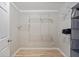 Spacious walk-in closet features built-in shelving for optimal organization at 1618 Cooper Lake Se Rd, Smyrna, GA 30082