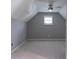 Upstairs bedroom illuminated by natural light and featuring carpeted flooring at 1910 Charleston Oak Cir, Lawrenceville, GA 30043