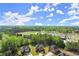 Scenic aerial view of a residential area surrounded by lush greenery and a golf course at 404 Prague Way, Hampton, GA 30228