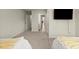 Bright bedroom featuring plush carpeting, and a wall-mounted television at 404 Prague Way, Hampton, GA 30228