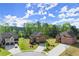 Beautiful three homes with well-manicured lawns and three car garages in a cul-de-sac at 404 Prague Way, Hampton, GA 30228