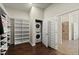 Convenient closet space with stackable washer and dryer connections near the Primary bath and closet at 404 Prague Way, Hampton, GA 30228