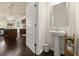 Stylish powder room features pedestal sink, elegant fixtures, and classic design at 404 Prague Way, Hampton, GA 30228