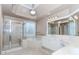 Bathroom with dual sinks, shower and tub at 4106 Creekview Ridge Ne Dr, Buford, GA 30518