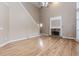 Spacious living room with a decorative fireplace, soaring ceilings and large windows with natural light at 4106 Creekview Ridge Ne Dr, Buford, GA 30518