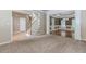 Open-concept living space with stairs and dining room, featuring hardwood floors, wainscoting, and natural light at 4106 Creekview Ridge Ne Dr, Buford, GA 30518