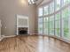 Elegant living room showcases natural light, a fireplace, and soaring ceilings at 4106 Creekview Ridge Ne Dr, Buford, GA 30518