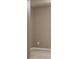 A tan walled room with white trim and light floors showing an electrical outlet at 4106 Creekview Ridge Ne Dr, Buford, GA 30518