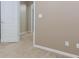 Bedroom featuring neutral carpet and a view into another room at 4106 Creekview Ridge Ne Dr, Buford, GA 30518