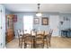 Cozy dining room featuring a wooden table with seating for six and lots of vintage decor at 45 Hunters Ridge Ct, Covington, GA 30014