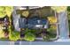 Aerial view of a well-maintained home with mature trees and landscaping at 498 Trip St, Grayson, GA 30017
