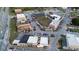Aerial view of vibrant commercial area with diverse buildings and ample parking at 498 Trip St, Grayson, GA 30017