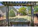 Landscaped backyard featuring a swing set and well-manicured lawn at 498 Trip St, Grayson, GA 30017