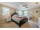Comfortable bedroom with a queen-sized bed, neutral decor, and lots of natural light at 498 Trip St, Grayson, GA 30017