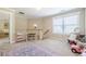 Bright and spacious bonus room with ample natural light and cozy carpet at 498 Trip St, Grayson, GA 30017