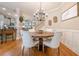 Charming dining room featuring stylish chairs, wood accents, and an elegant chandelier at 498 Trip St, Grayson, GA 30017