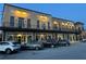 Commercial building with apartments with balconies above street-level businesses at 498 Trip St, Grayson, GA 30017