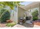 Exterior side view with a patio, garden, and convenient access to the home's side entrance at 498 Trip St, Grayson, GA 30017
