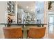 View of kitchen with bar seating, stainless appliances, and light-colored cabinets at 498 Trip St, Grayson, GA 30017