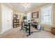 Comfortable office featuring a ceiling fan, natural light, and built-in storage at 498 Trip St, Grayson, GA 30017