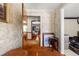 Welcoming entryway featuring hardwood floors and decorative wallpaper at 3127 Hidden Forest Dr, Snellville, GA 30078