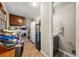 Practical laundry room featuring a washer, dryer, and storage shelves, designed for efficient chore management and organization at 3127 Hidden Forest Dr, Snellville, GA 30078