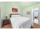 Cozy bedroom with neutral walls, comfortable bed, side table and easy access to the ensuite bathroom at 3599 Bellmonte Dr, Atlanta, GA 30337