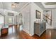 Spacious foyer featuring hardwood floors, an arched doorway, and decorative accents at 3599 Bellmonte Dr, Atlanta, GA 30337