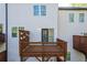 Wooden deck with railing offers an outdoor living space with partial shade at 518 Scenic Pass, Woodstock, GA 30189