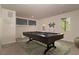 Recreation room with a pool table, twin TV screens, and neutral carpeting at 518 Scenic Pass, Woodstock, GA 30189