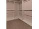 Spacious walk-in closet with ample shelving and storage space at 518 Scenic Pass, Woodstock, GA 30189