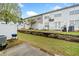 Private backyard with a lawn, concrete patio, privacy fence, and retaining wall at 6703 Gallant Se Ct, Mableton, GA 30126