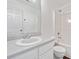 Bright bathroom featuring a shower-tub combination and single vanity with a white countertop at 6703 Gallant Se Ct, Mableton, GA 30126