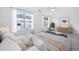 Bright bedroom features large windows, ceiling fan, and neutral decor at 6703 Gallant Se Ct, Mableton, GA 30126