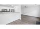 Open kitchen with stainless steel appliances, and sleek white cabinets at 6703 Gallant Se Ct, Mableton, GA 30126